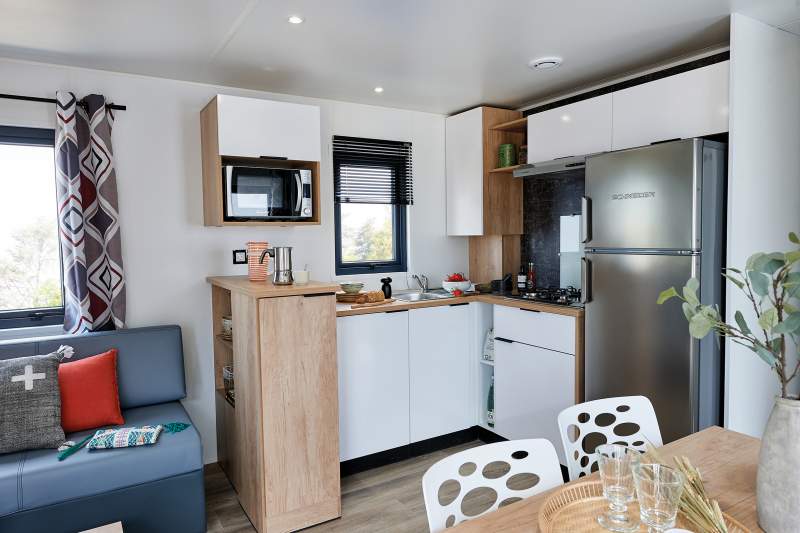 Mobilheim Santa Giulia - Wohnzimmer und Küche